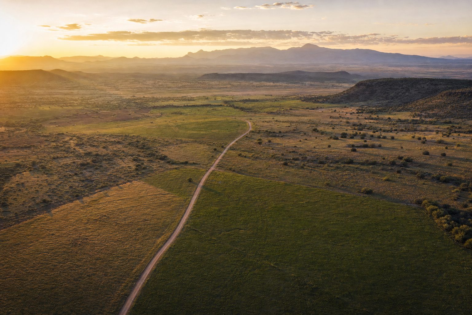 Open Sun Belt land at sunrise